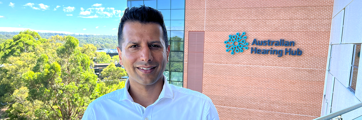 Sandeep, Head of Applications at Hearing Australia, smiling warmly