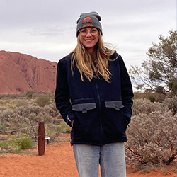 Madeleine, Outreach Audiologist and Clinical Operations Manager for Northern Territory at Hearing Australia, smiling warmly
